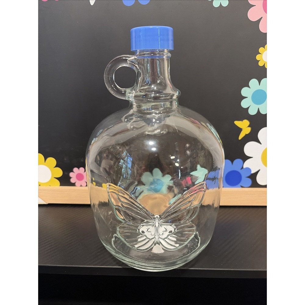 Dolly Parton 64 oz Glass Growler Moonshine Jug Butterfly Design NEW 9 1/2×5 1/2